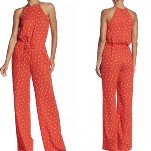 Diane von Furstenberg red sleeveless jumpsuit